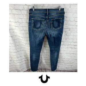 Halle Super Skinny Mid Rise Curved Raw Hem Jeans